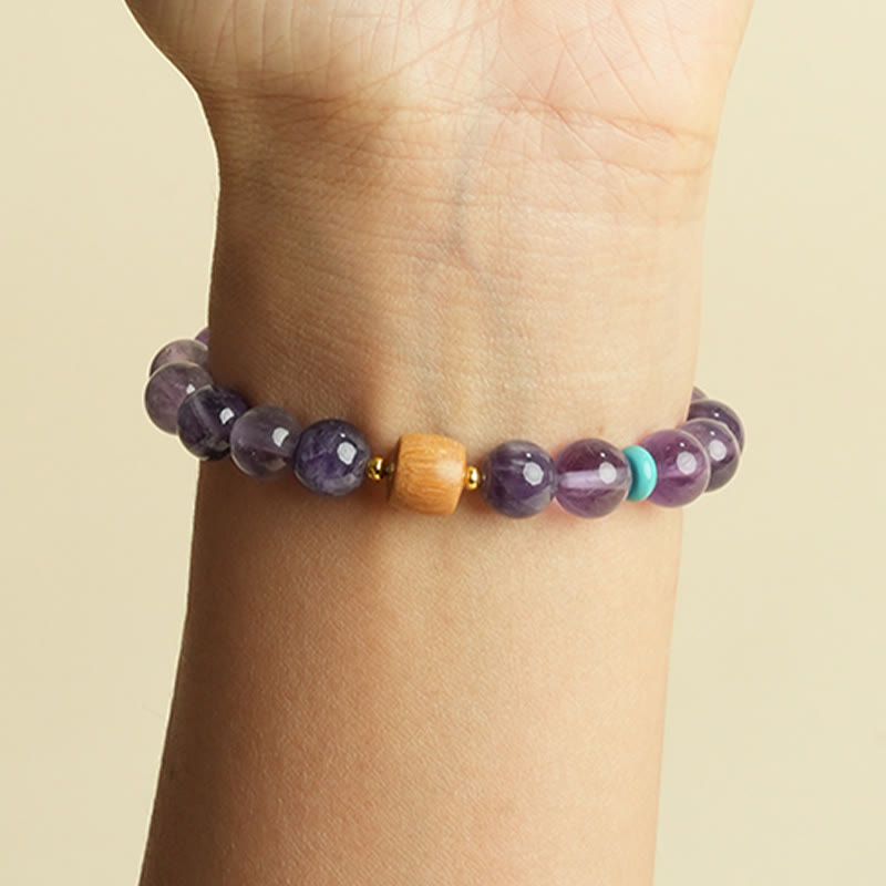 Pulsera de la paz con cuentas de madera de la suerte y amatista natural de Buddha Stones