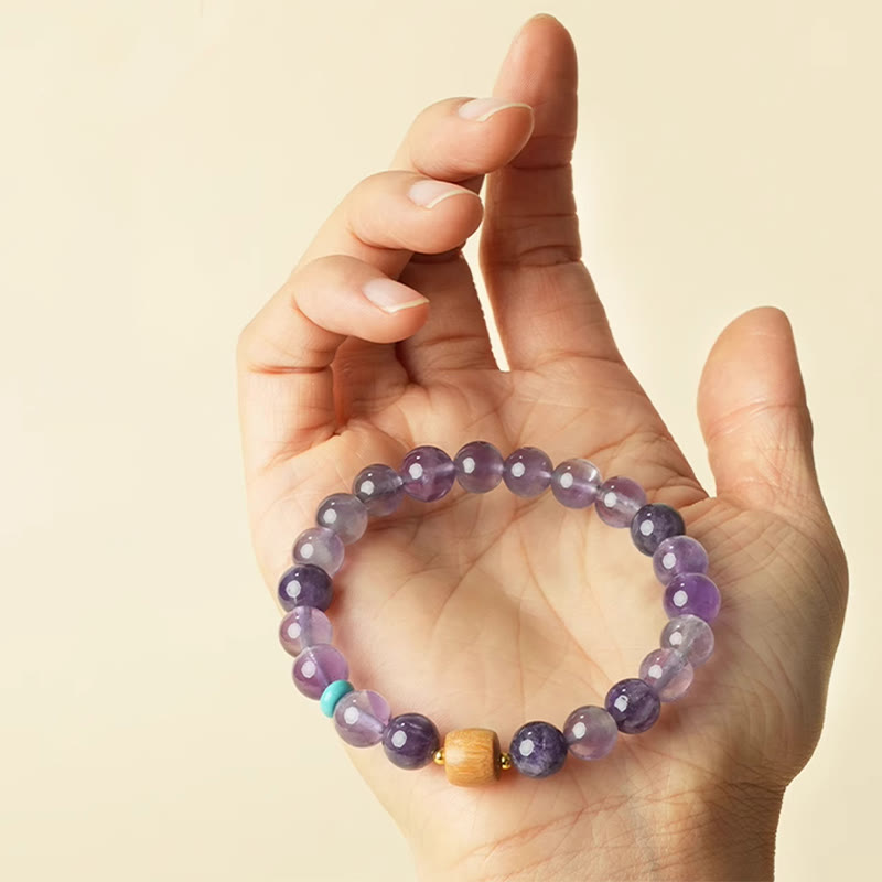 Pulsera de la paz con cuentas de madera de la suerte y amatista natural de Buddha Stones