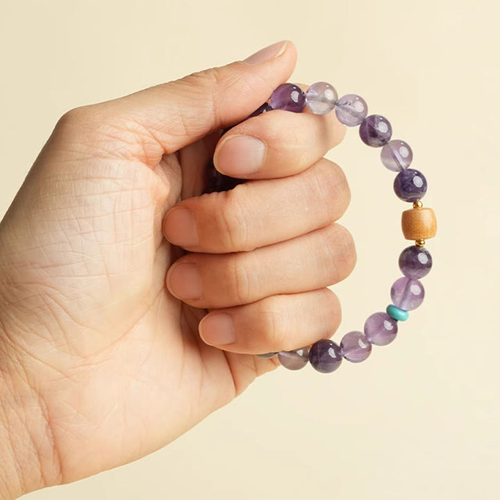 Pulsera de la paz con cuentas de madera de la suerte y amatista natural de Buddha Stones