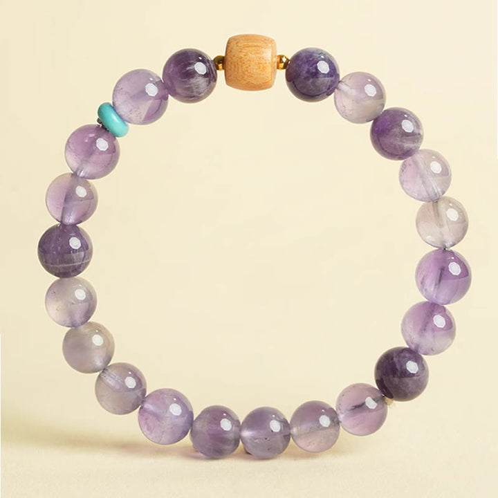 Pulsera de la paz con cuentas de madera de la suerte y amatista natural de Buddha Stones
