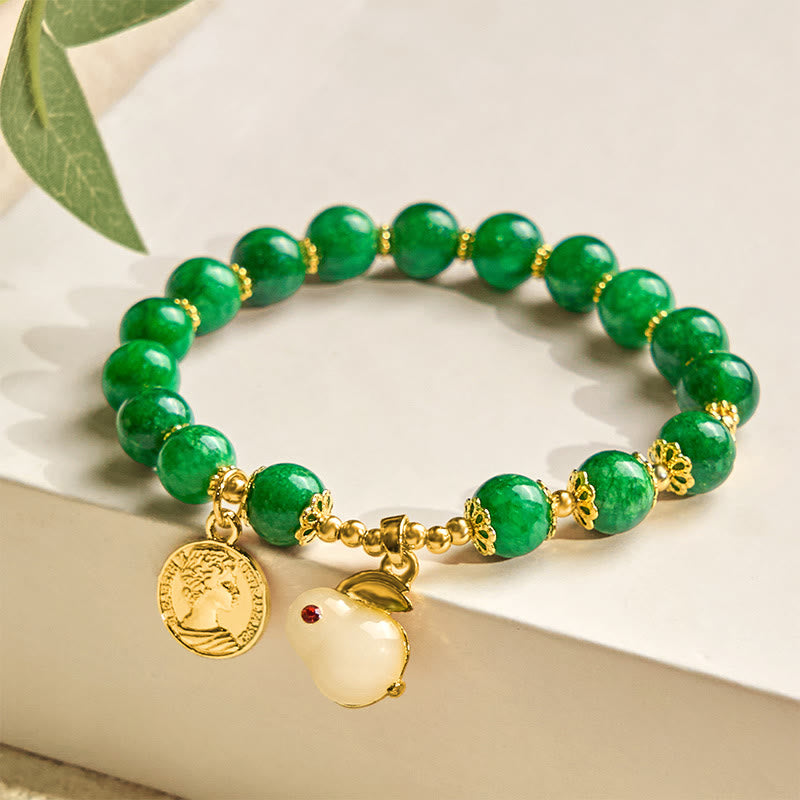 Pulsera con encanto de conejo y calcita verde de Buddha Stones