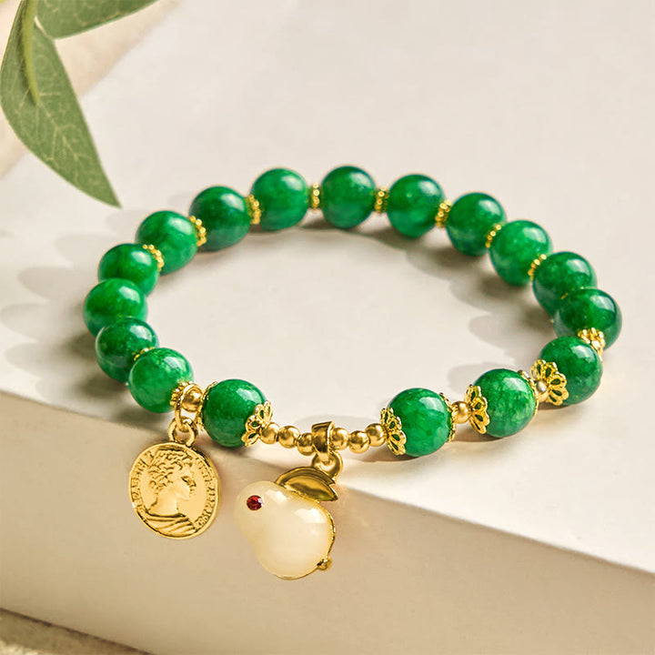 Pulsera con encanto de conejo y calcita verde de Buddha Stones