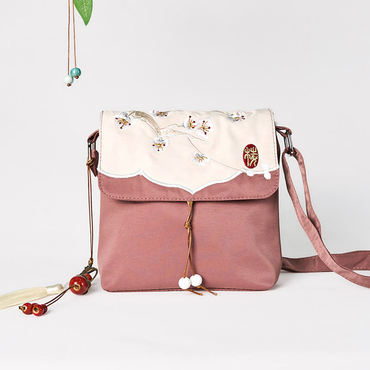 Bolso bandolera de lino y algodón con bordado de Buddha Stones , color marrón liso y ciruela.