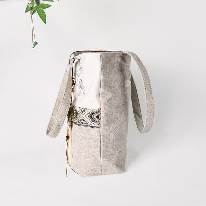 Bolso de hombro de lona y poliéster con bordado de magnolia y Buddha Stones