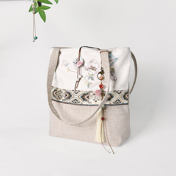 Bolso de hombro de lona y poliéster con bordado de magnolia y Buddha Stones