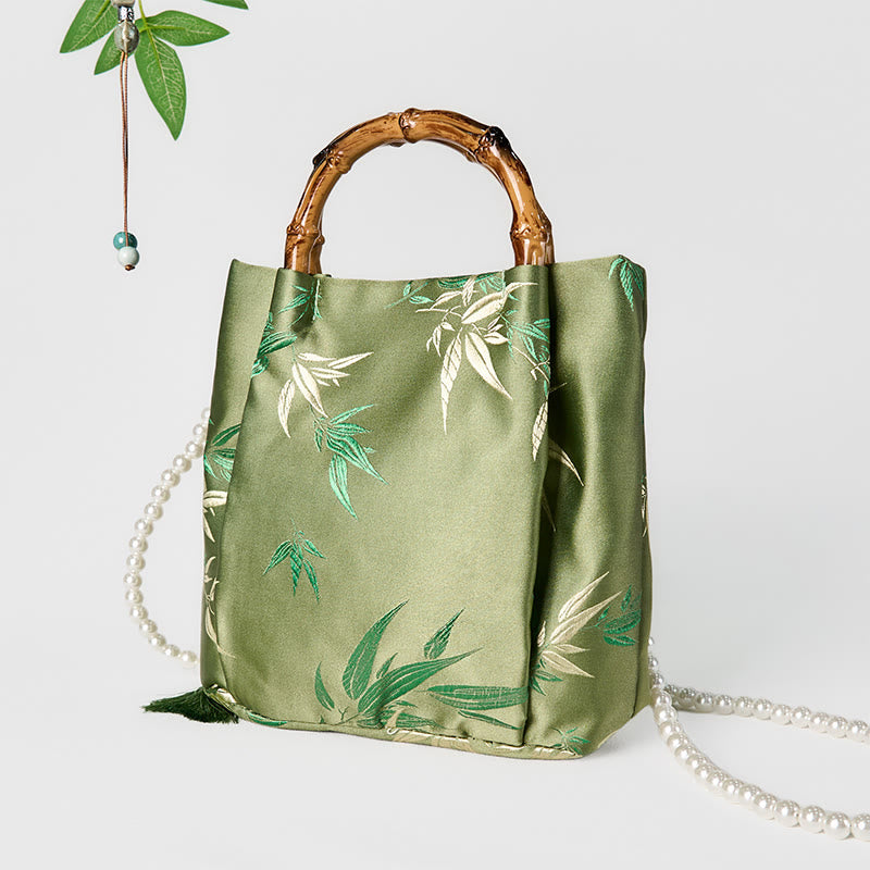Bolso bandolera con asa de bambú y perlas, con bordado de hojas y Buddha Stones