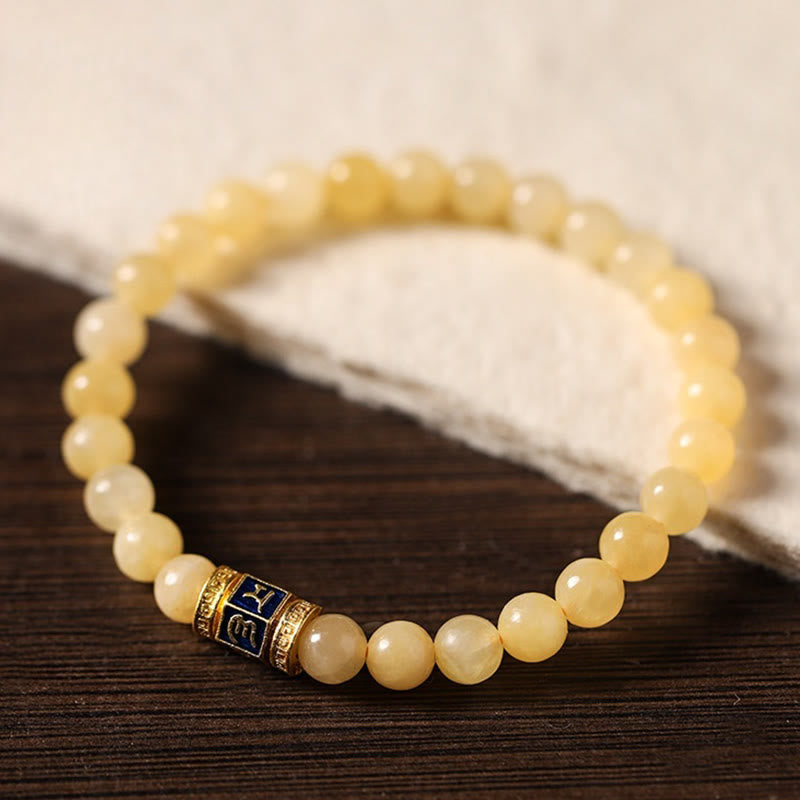Pulsera de la fortuna de Om Mani Padme Hum con cuentas de topacio y Buddha Stones