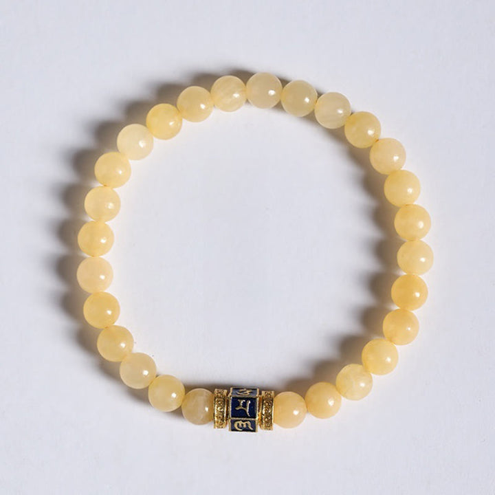 Pulsera de la fortuna de Om Mani Padme Hum con cuentas de topacio y Buddha Stones