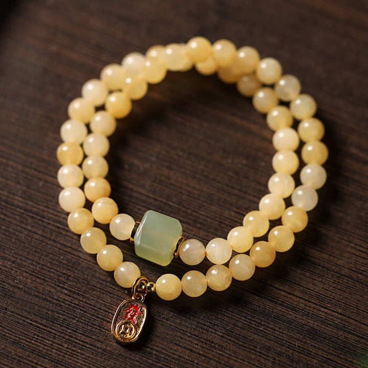 Pulsera de riqueza con doble círculo de cubo de jade y cuentas de topacio de Buddha Stones
