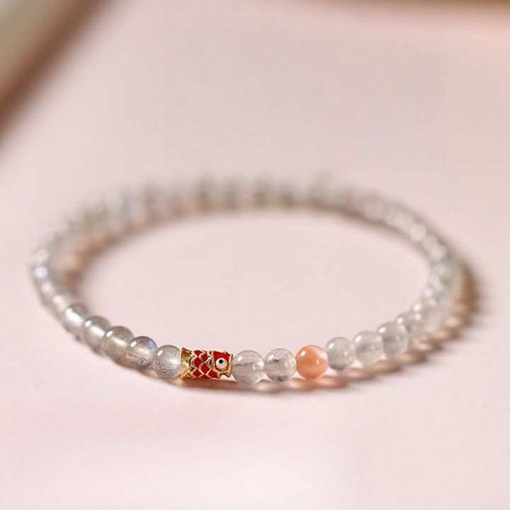 Buddha Stones Pulsera curativa ultrafina de piedra lunar con pez koi
