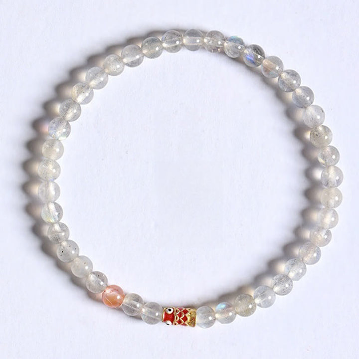Buddha Stones Pulsera curativa ultrafina de piedra lunar con pez koi