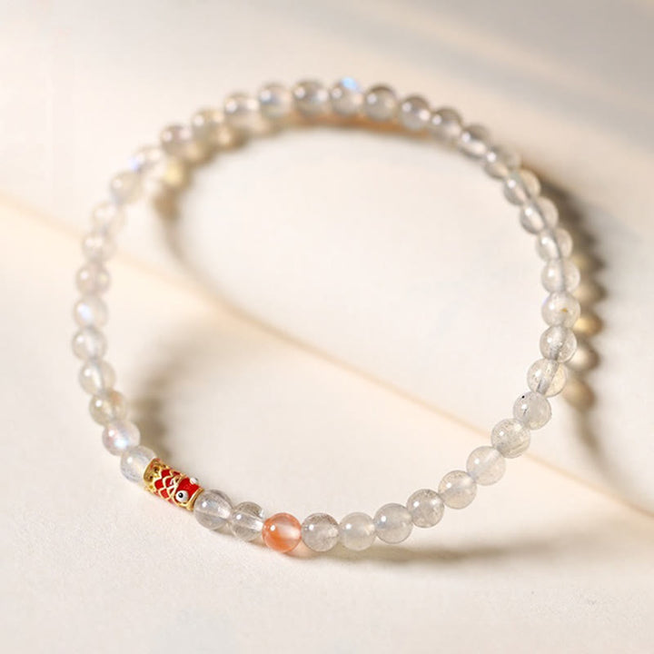 Buddha Stones Pulsera curativa ultrafina de piedra lunar con pez koi