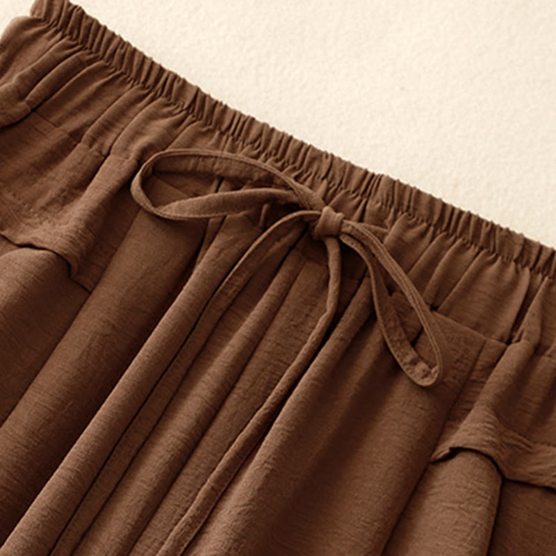 Pantalones cortos de pierna ancha con bolsillos y diseño Buddha Stones sencillo con cordón ajustable para mujer - image 2