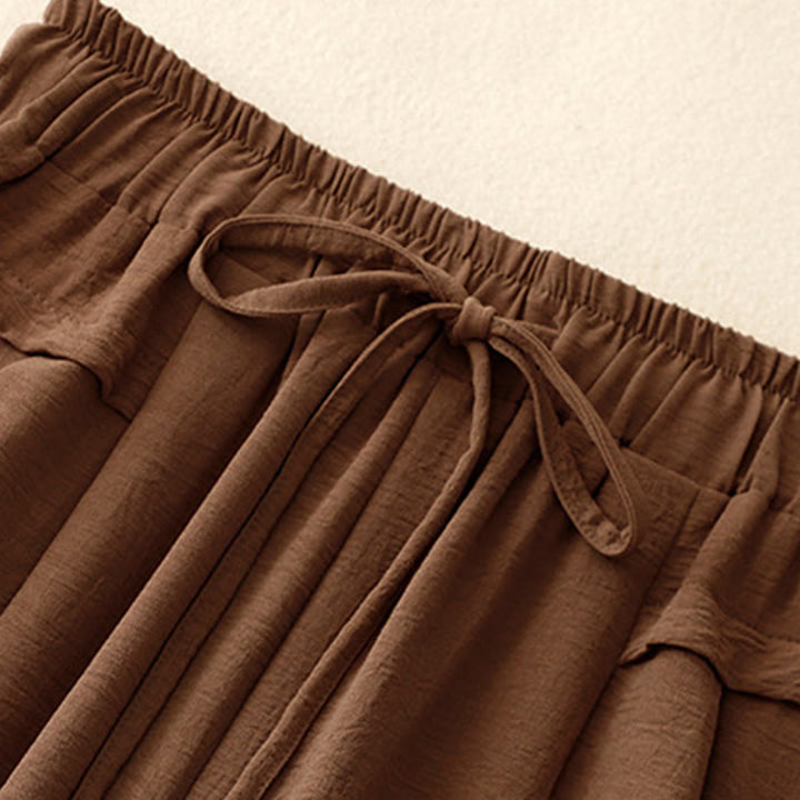 Pantalones cortos de pierna ancha con bolsillos y diseño Buddha Stones sencillo con cordón ajustable para mujer - image 2