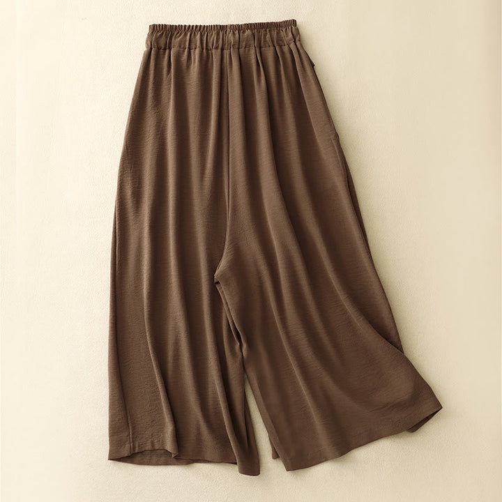 Pantalones cortos de pierna ancha con bolsillos y diseño Buddha Stones sencillo con cordón ajustable para mujer - image 1