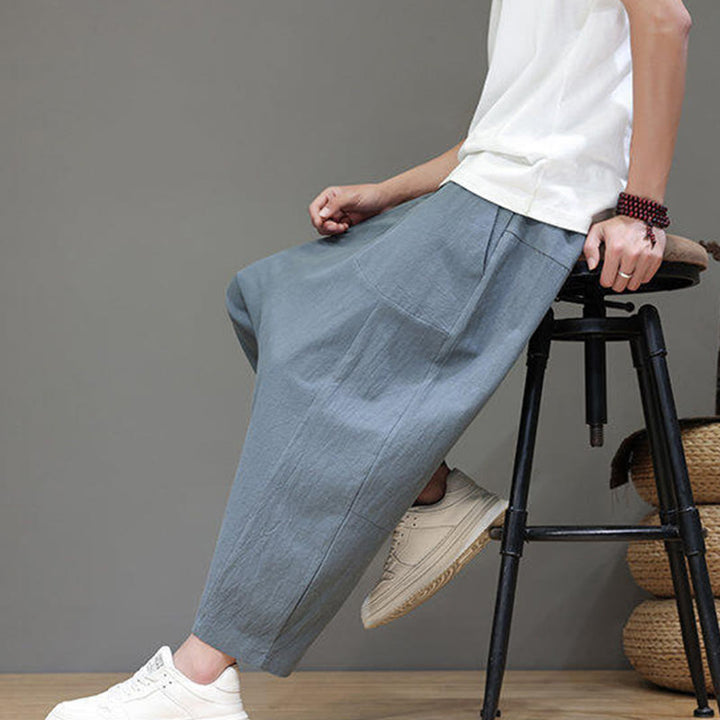Pantalones casuales Buddha Stones de algodón con cintura elástica, pierna ancha y bolsillos, con cordón ajustable y diseño de entrepierna baja para hombre.