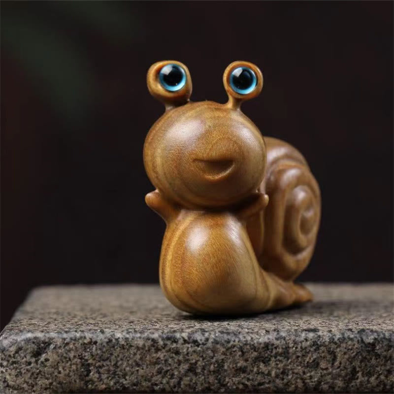 Mini caracol tallado de sándalo verde con Buddha Stones para decoración de escritorio