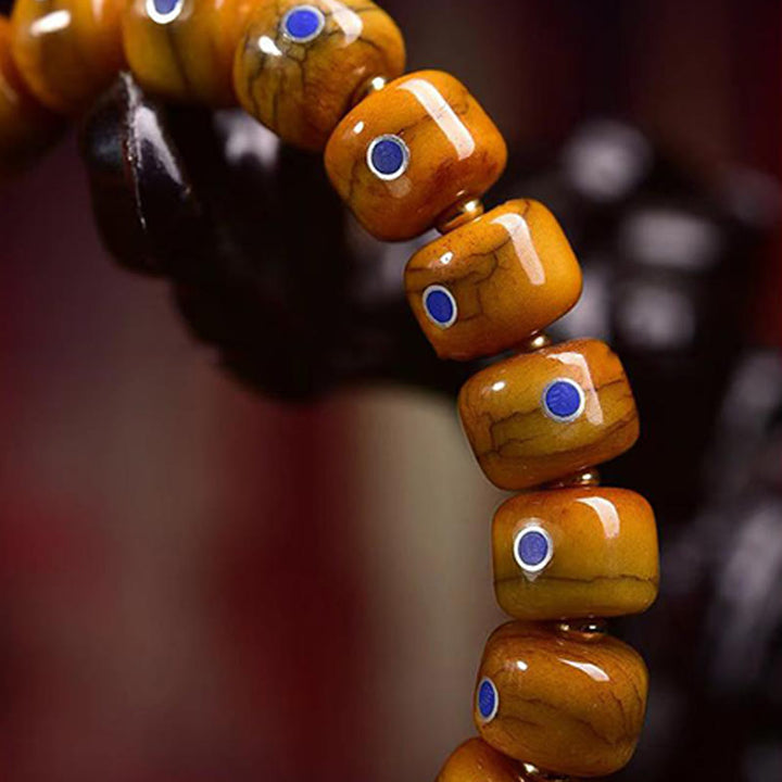 Pulsera de cuerda trenzada con cuentas de hueso tibetano vintage de Buddha Stones y lazurita