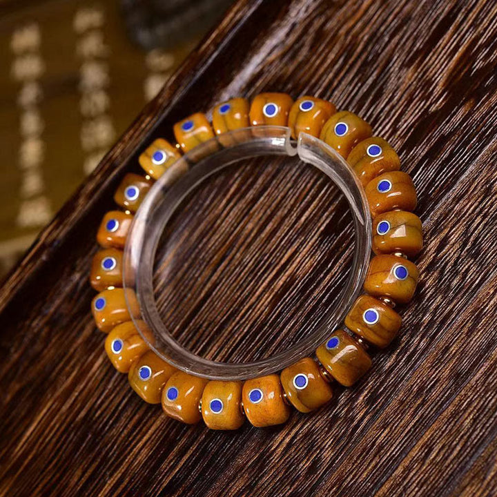 Pulsera de equilibrio positivo con cuerda trenzada y cuentas de hueso tibetano vintage de Buddha Stones