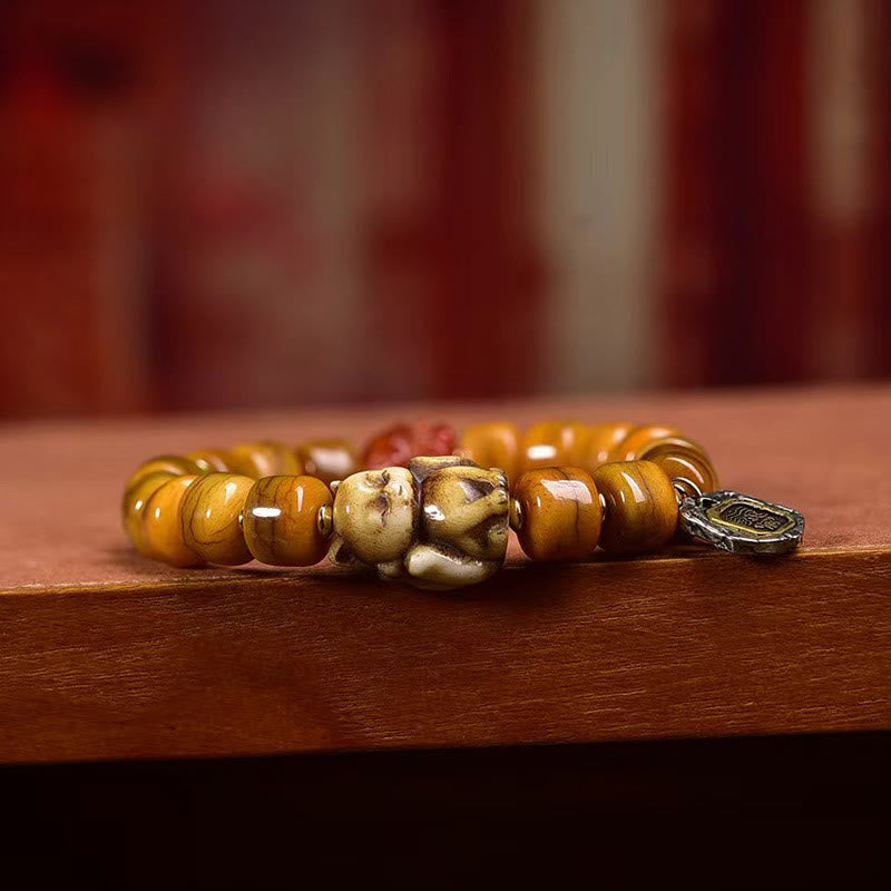 Pulsera de equilibrio con cuentas de hueso tibetano vintage de Buddha Stones y cuentas Dzi con forma de zorro