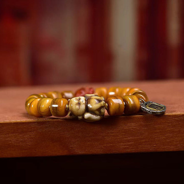 Pulsera de equilibrio con cuentas de hueso tibetano vintage de Buddha Stones y cuentas Dzi con forma de zorro