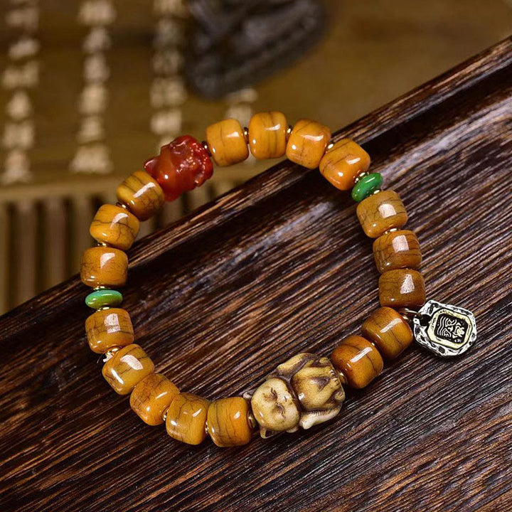 Pulsera de equilibrio con cuentas de hueso tibetano vintage de Buddha Stones y cuentas Dzi con forma de zorro