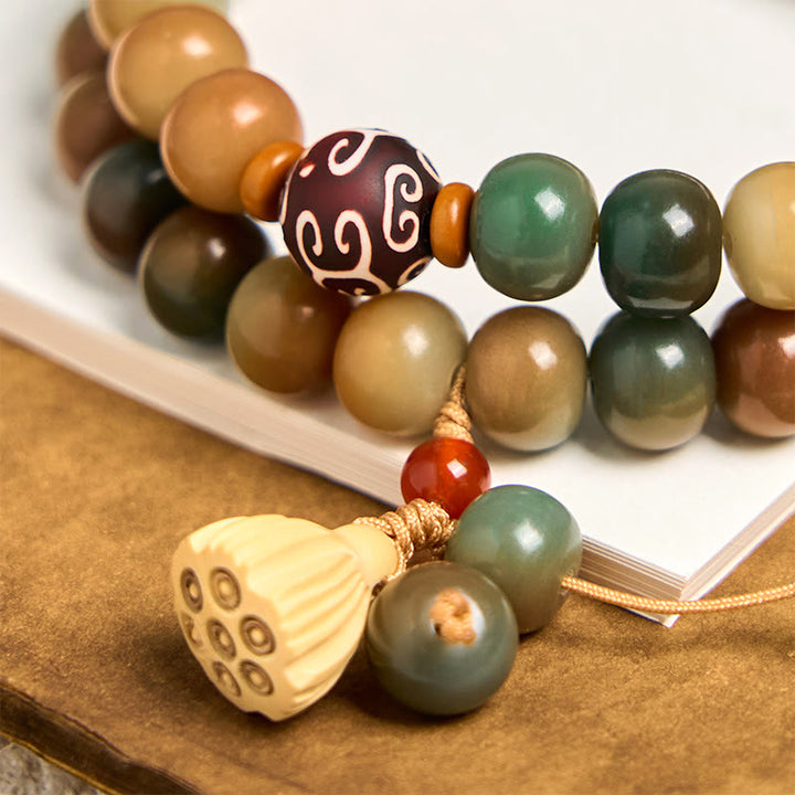 Pulsera de doble vuelta con dije de vaina de loto y semillas de bodhi coloridas de Buddha Stones