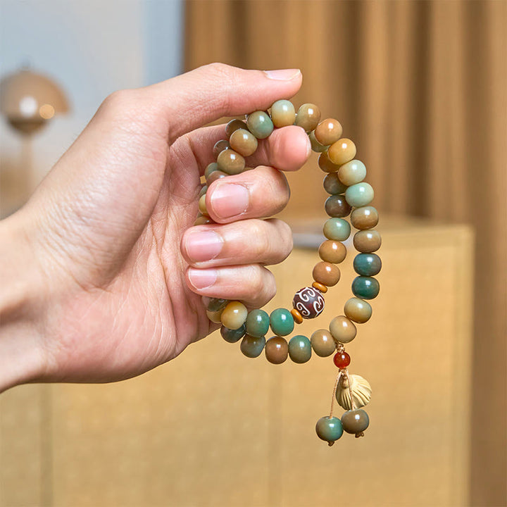 Pulsera de doble vuelta con dije de vaina de loto y semillas de bodhi coloridas de Buddha Stones