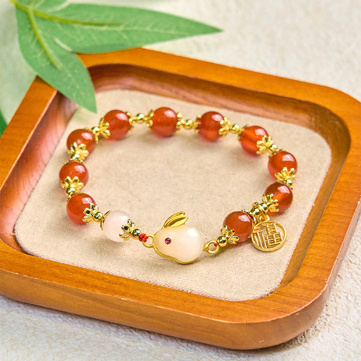 Pulsera de confianza con Buddha Stones, ágata roja, calcedonia, conejo y carácter Fu