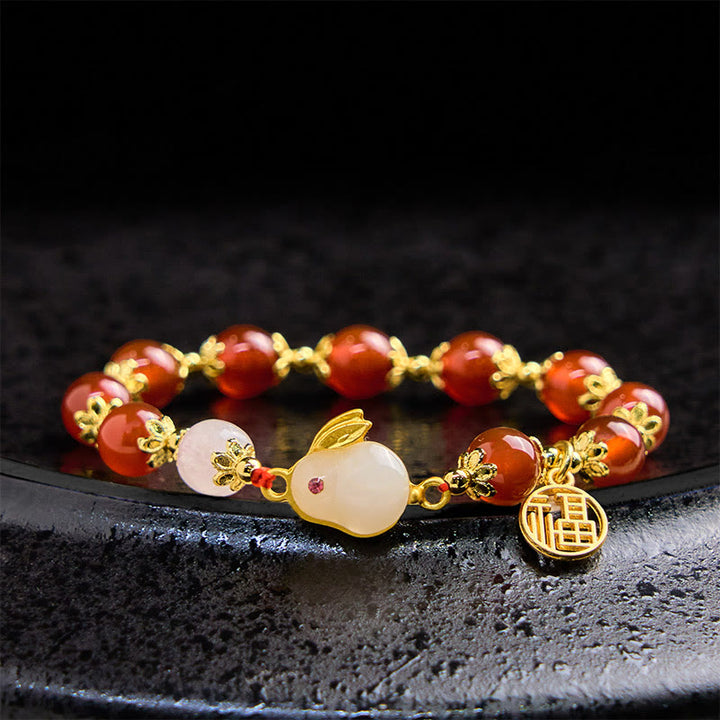 Pulsera de confianza con Buddha Stones, ágata roja, calcedonia, conejo y carácter Fu