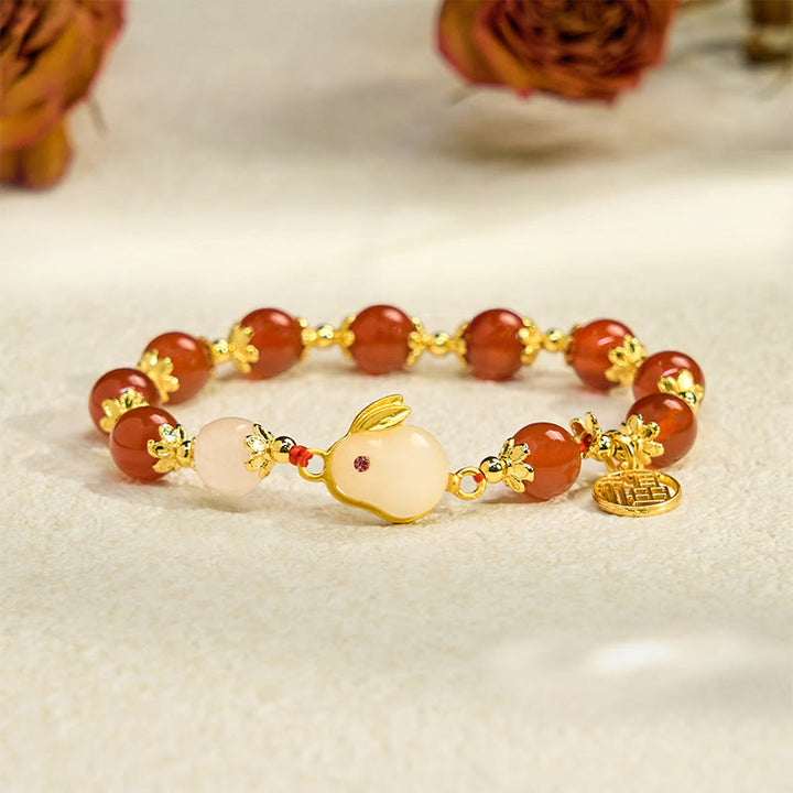 Pulsera de confianza con Buddha Stones, ágata roja, calcedonia, conejo y carácter Fu