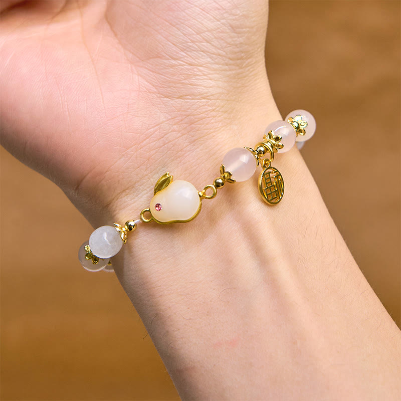 Pulsera de confianza con Buddha Stones, ágata roja, calcedonia, conejo y carácter Fu