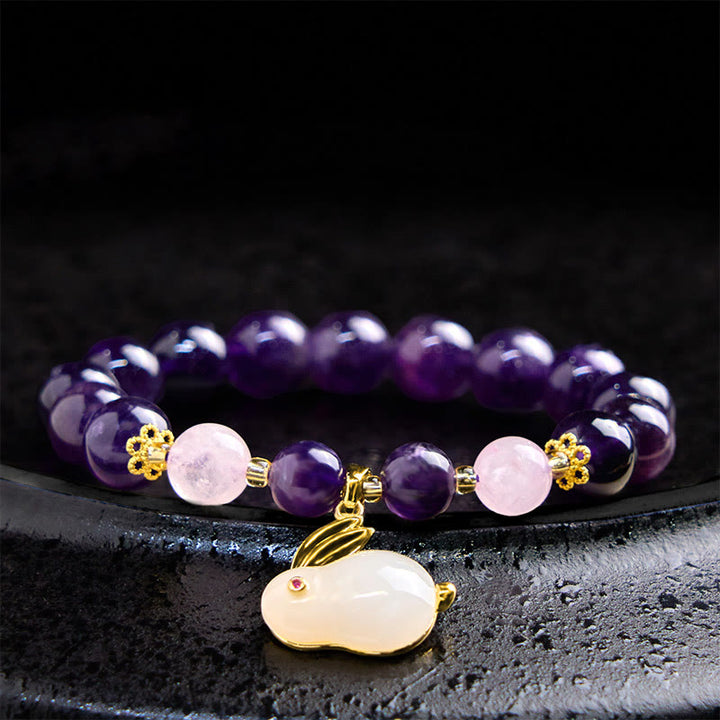 Pulsera de paz interior con cuentas de conejo y amatista natural de Buddha Stones