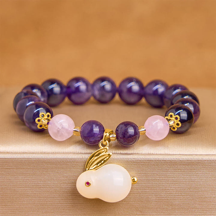 Pulsera de paz interior con cuentas de conejo y amatista natural de Buddha Stones