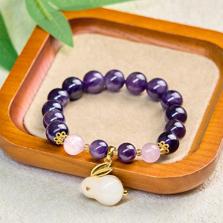 Pulsera de paz interior con cuentas de conejo y amatista natural de Buddha Stones