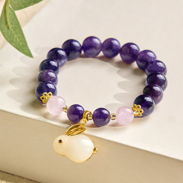 Pulsera de paz interior con cuentas de conejo y amatista natural de Buddha Stones