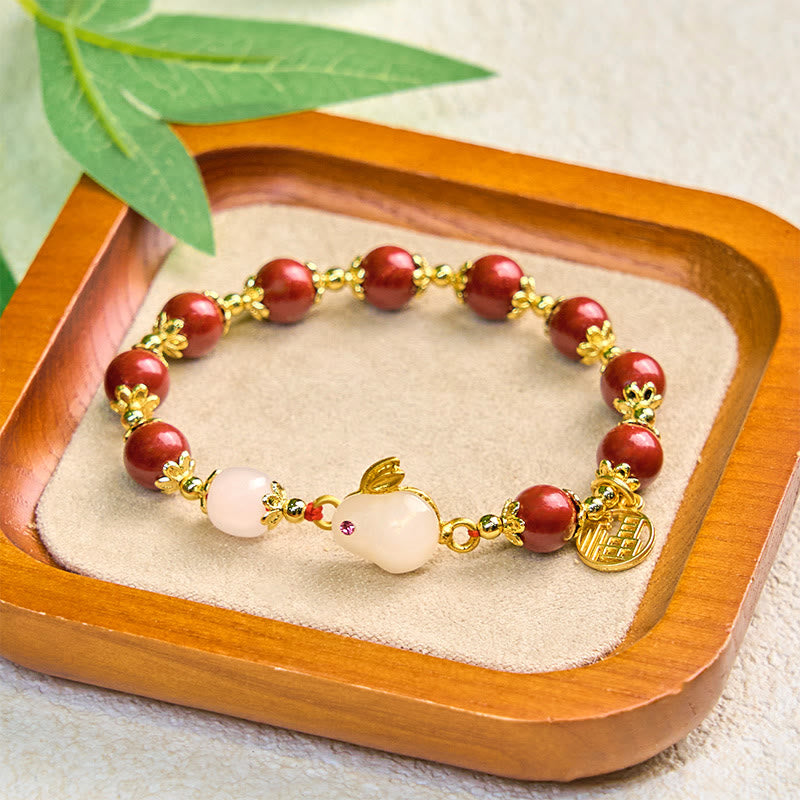 Pulsera con dije de bendición de Buddha Stones de cinabrio y un lindo conejo Fu