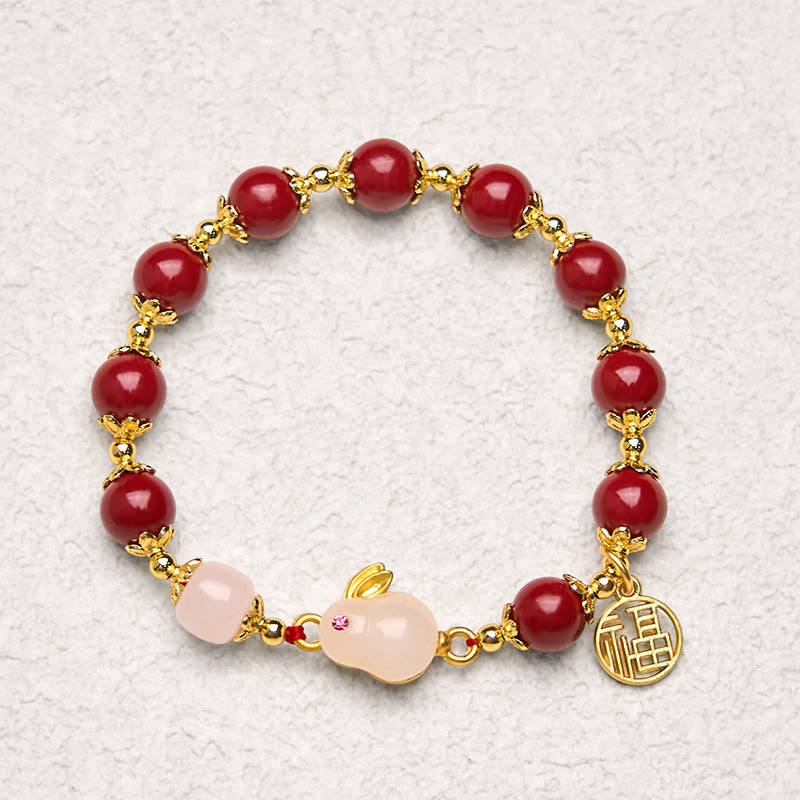 Pulsera con dije de bendición de Buddha Stones de cinabrio y un lindo conejo Fu