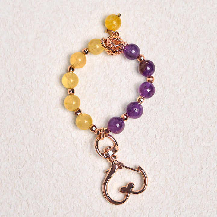 Llavero colgante con cuentas de amatista y citrino naturales de Buddha Stones