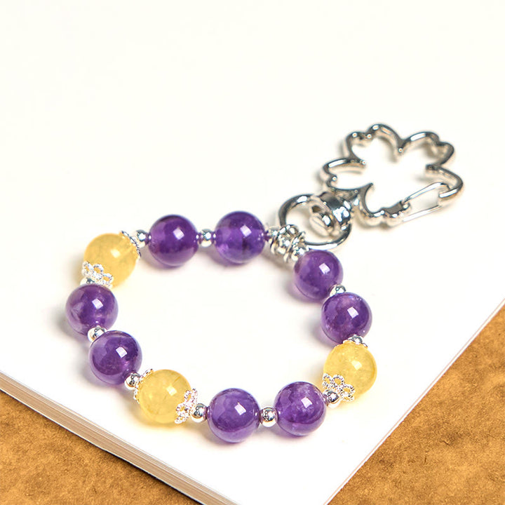 Llavero con colgante de bolsa de amatista y citrino natural con Buddha Stones