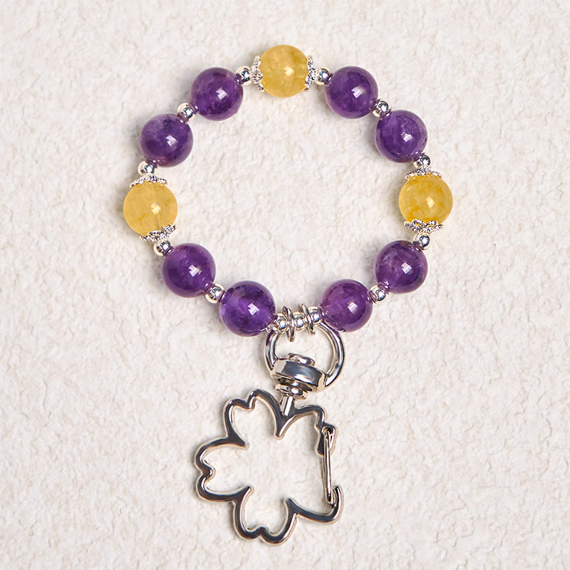 Llavero con colgante de bolsa de amatista y citrino natural con Buddha Stones