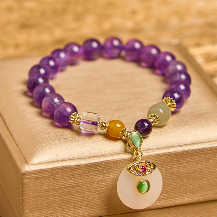 Pulsera espiritual con dije de paz y amatista natural de Buddha Stones