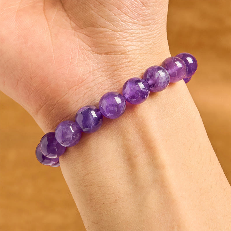 Pulsera espiritual con dije de paz y amatista natural de Buddha Stones