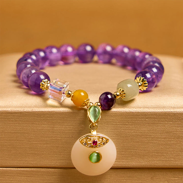 Pulsera espiritual con dije de paz y amatista natural de Buddha Stones