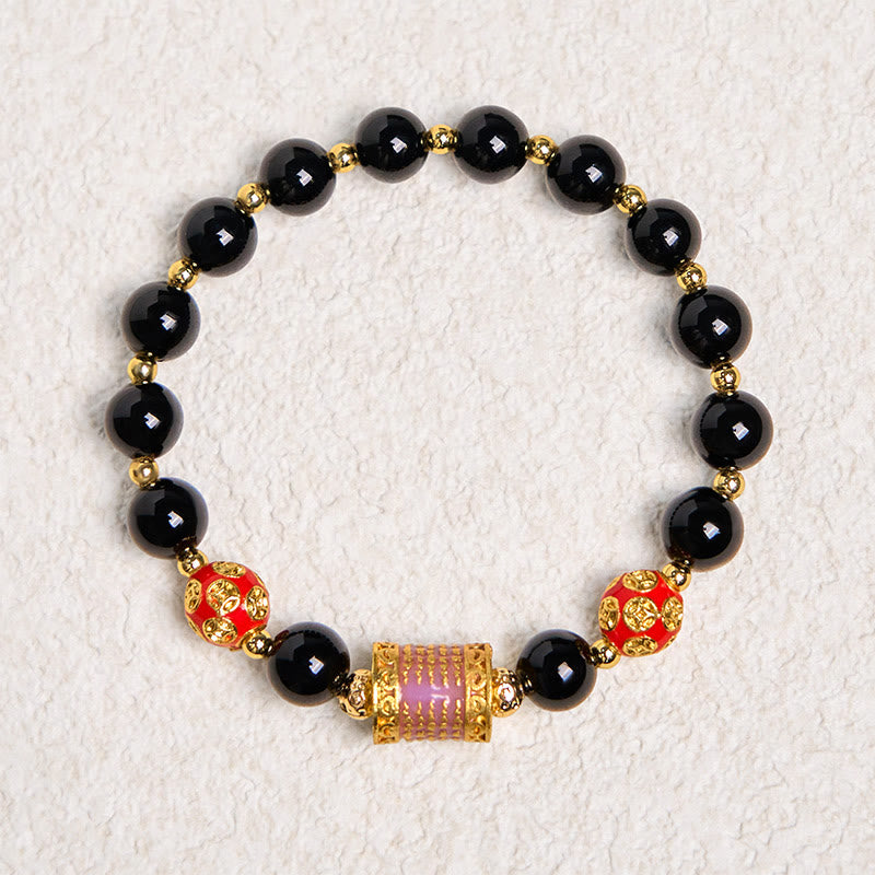 Pulsera de la fortuna con monedas de cobre y cinco escrituras de ónix negro natural de Buddha Stones