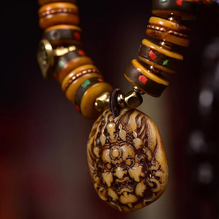 Pulsera de protección con borlas de hueso de camello tibetano y Buddha Stones