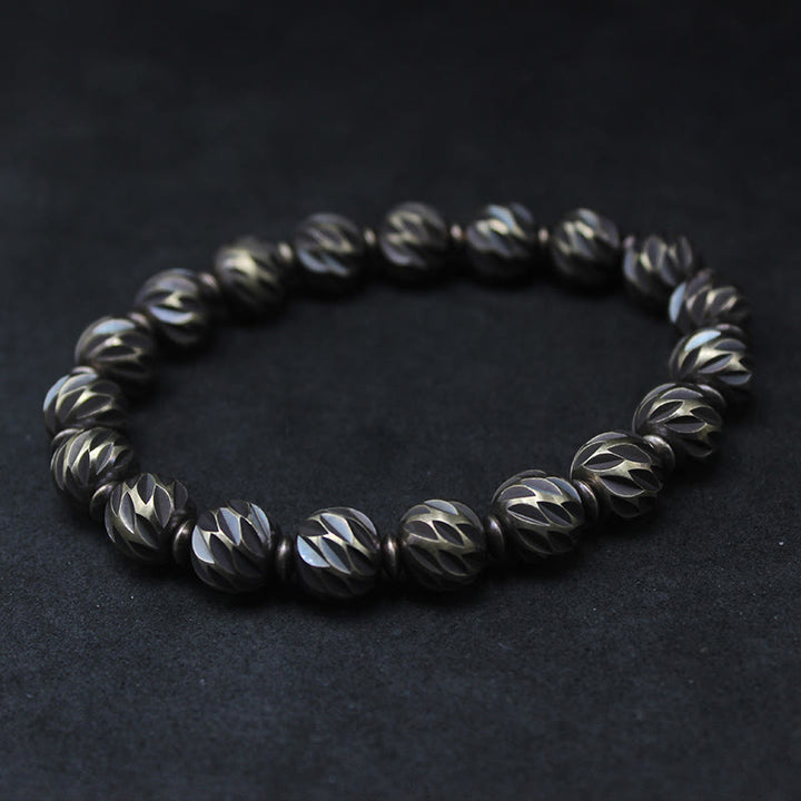 Pulsera de riqueza con cuentas de cobre y latón, con diseño de cuchillo tallado envejecido y Buddha Stones