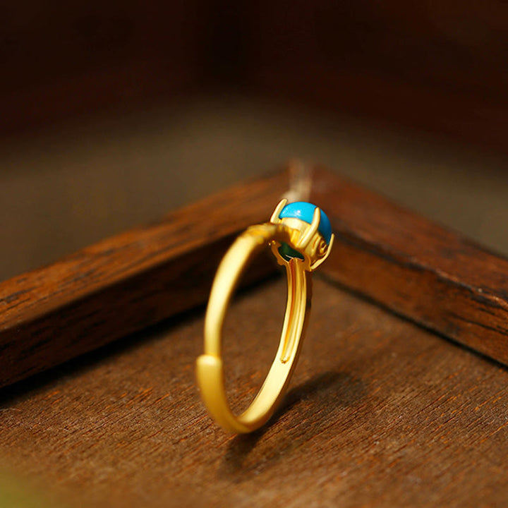 Anillo ajustable de cobre con protección turquesa y diseño simple de Buddha Stones
