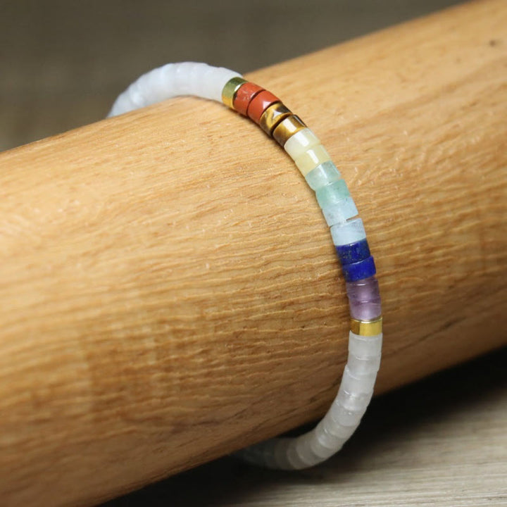 Pulsera de cuentas espaciadoras de ónix negro y cristal blanco natural de Buddha Stones