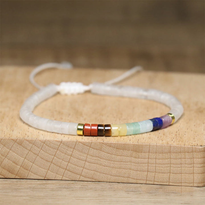 Pulsera de cuentas espaciadoras de ónix negro y cristal blanco natural de Buddha Stones